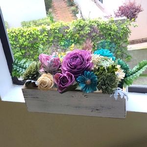 Planter box with solawood flowers